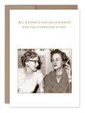 This vintage-inspired "One Of Us Is Right Birthday Card" by Shannon Martin Design showcases a photo of two women sitting together, with one woman smoking. The text above them humorously states, "All I know is one of us is right and the other one is you." Made in the USA from recycled paper for a sustainable touch.