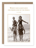 Four women in vintage swimsuits joyfully play at the beach, with two standing in the water carrying the others on their shoulders. Above them, a quote by Coco Chanel reads, "Women have always been the strong ones of the world." This scene is beautifully depicted on Shannon Martin Design's Strong Ones Friendship Card, making it ideal for placing inside a Kraft envelope alongside cherished vintage photos.