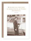 The "Great Trouble Birthday Card" by Shannon Martin Design features a sepia-toned photo of a young boy standing beside a vintage car, printed on recycled paper. Above the image, it reads, "My mother had a great deal of trouble with me, but I think she enjoyed it." - Mark Twain. Made in the USA.