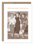 Three women dressed in vintage clothing and wide-brim hats are smiling on a terrace, captured as if from old photographs. The text above them reads: Know your worth, then add tax. This scene graces the front of the Shannon Martin Design's "Know Your Worth" birthday card.