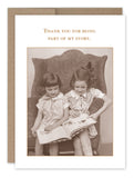 The "Part Of My Story Friendship / Just Because Card" by Shannon Martin Design features two young girls on a chair reading, with the message ‚ÄúThank you for being part of my story.‚Äù Made in the USA from recycled paper; a simple, classic design.
