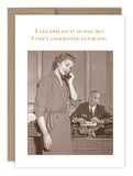 The Explain It Birthday Card by Shannon Martin Design features a vintage-style illustration on recycled paper, depicting a woman in a dress using a rotary phone in an office while a man in a suit watches her from behind the desk. The text above reads, "I can explain it to you, but I can't understand it for you." Proudly made in the USA.