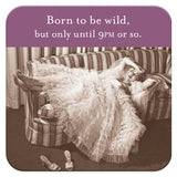 A woman in a ruffled gown lounges on a striped couch with her arm over her forehead, her shoes on the floor beside Shannon Martin Design‚Äôs Born To Be Wild Coasters. The text above reads, "Born to be wild, but only until 9PM or so," making them the perfect hostess gift.