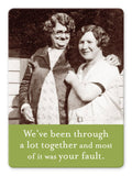 Two women in vintage attire stand closely together, smiling alongside the playful caption, "We‚Äôve been through a lot together and most of it was your fault." Their connection is as strong as the "Been Through A Lot Magnet" by Shannon Martin Design, always pulling them back for more fun adventures.