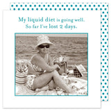 A woman in a swimsuit and hat lounges on the beach with sunglasses and a woven bag. The humorous caption above says, "My liquid diet is going well‚Äîso far I've lost 2 days." The image, framed with a fun polka dot border, shows her sipping from eco-friendly Liquid Diet Beverage Napkins by Shannon Martin Design.